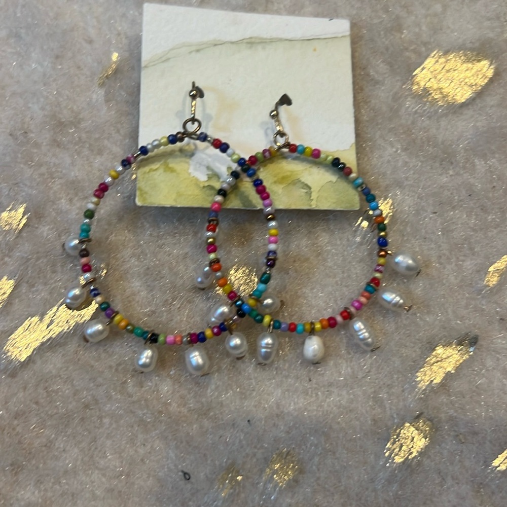 Earrings!  Beaded, fresh water pearl pierced.